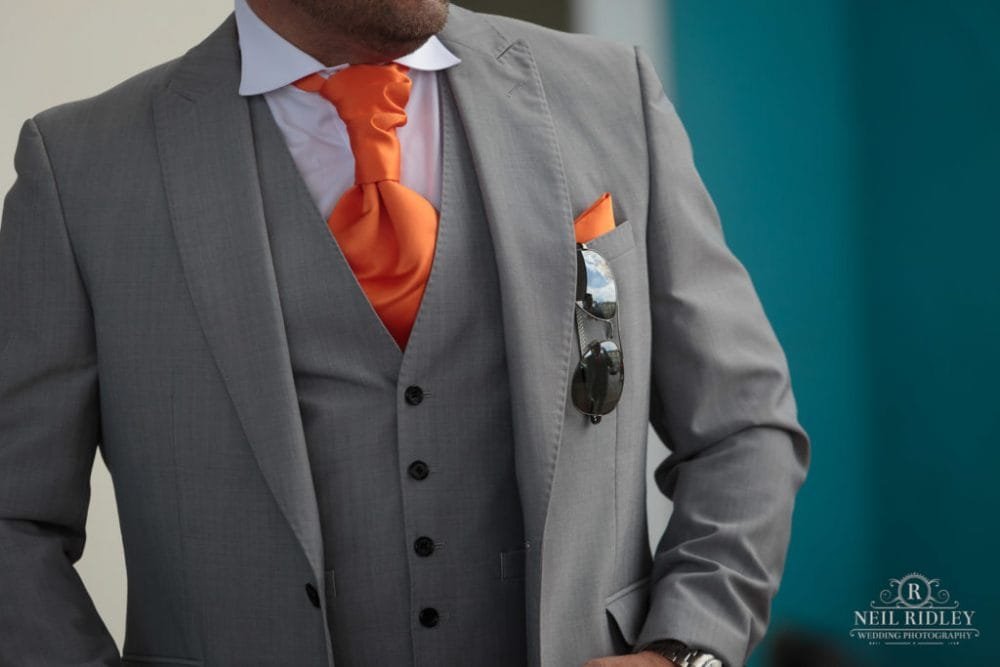 Grooms Grey suit outside The Big Blue Hotel in Blackpool