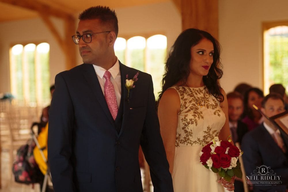 Merrydale Manor Wedding Photographer - Bride and Groom during the service