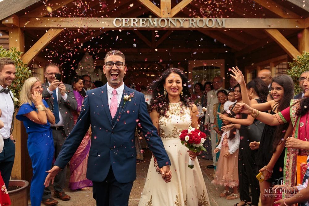 Merrydale Manor Wedding Photographer - Bride and Groom confetti throw