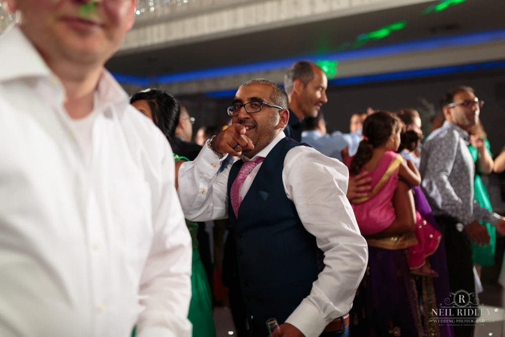 Merrydale Manor Wedding Photographer - Best man pointing at the camera