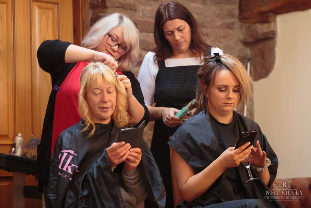 Bridesmaids Play on their phones at Beeston Manor