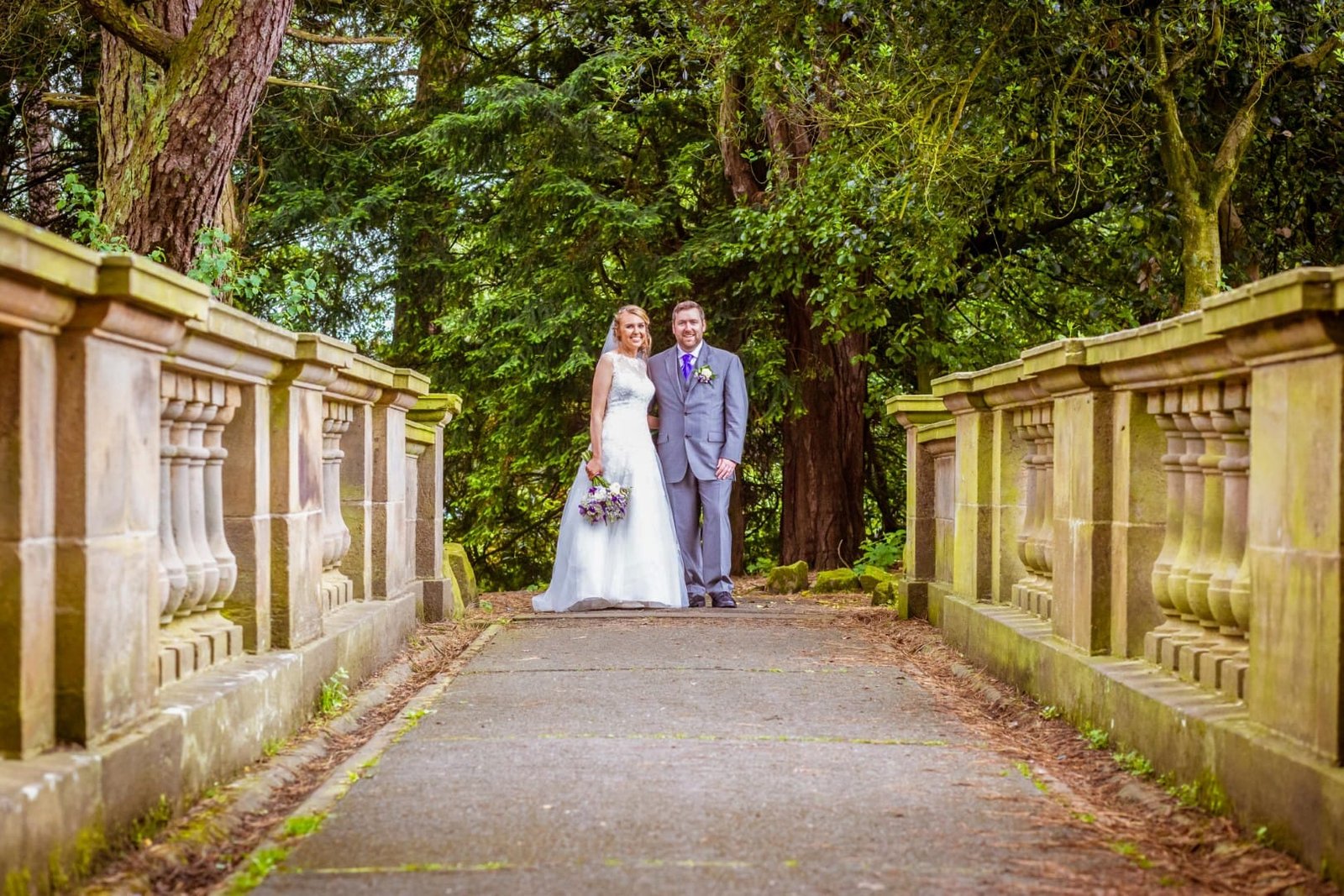 Lancaster Wedding couple posing in Williamson Park