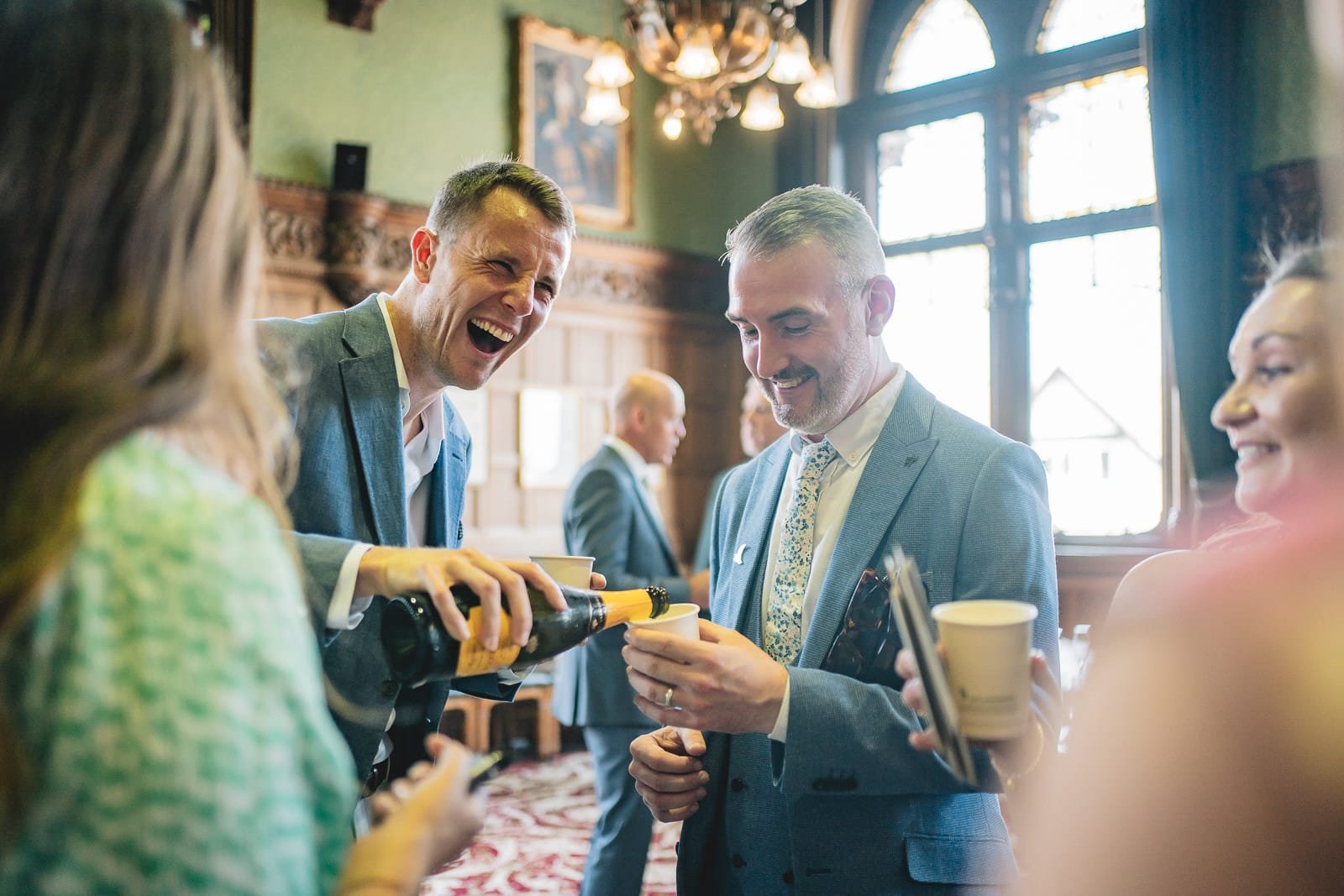 NRB03202 Chester Town Hall Wedding Guest Laughing