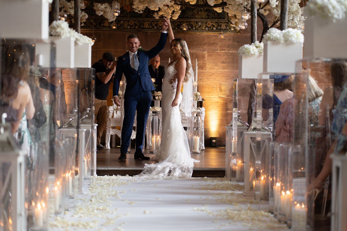 NR708554 Peckforton Castle Wedding Bride and Groom celebrate