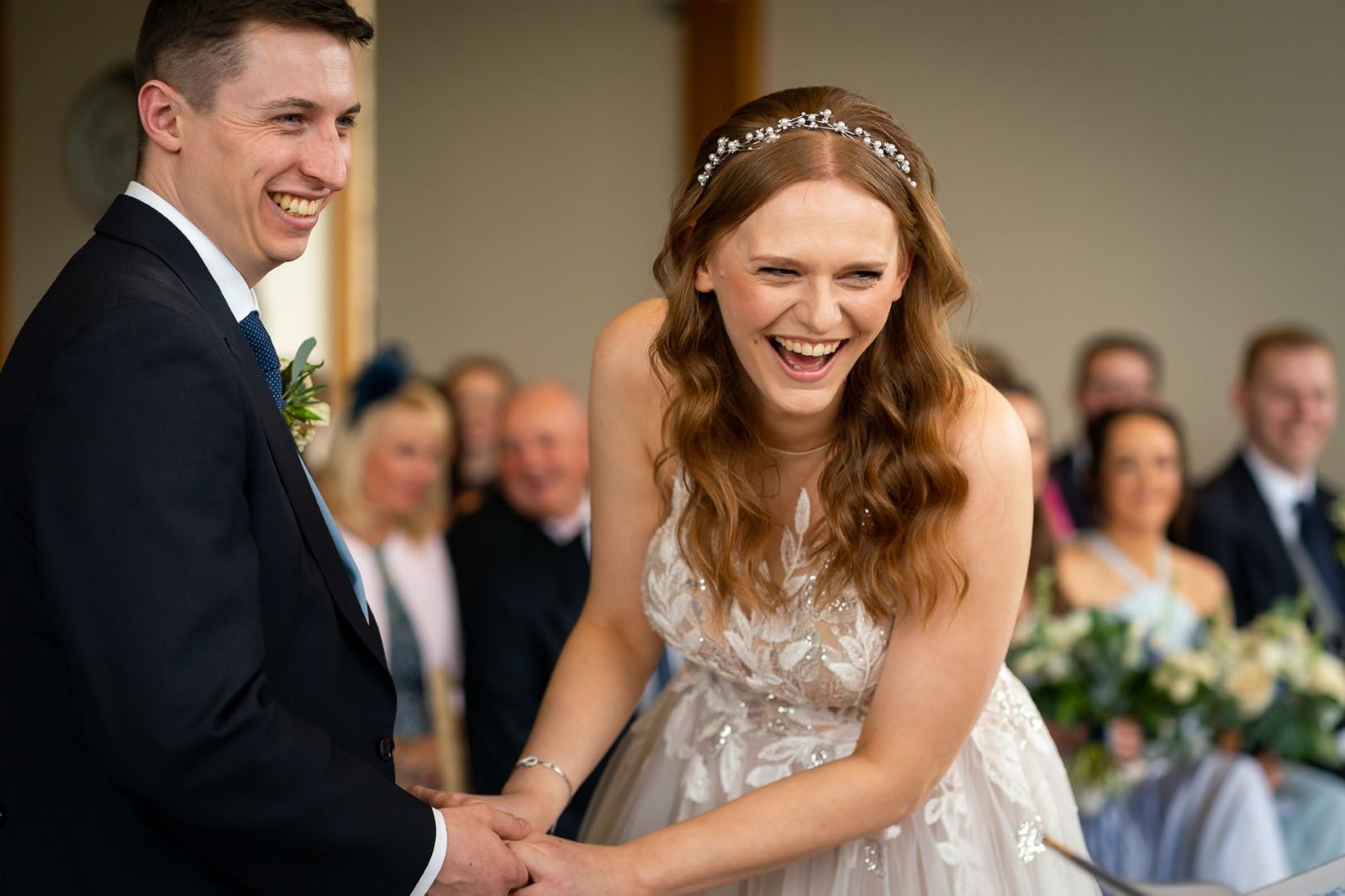 laughter The Out Barn Wedding Photographer Bride laughing during ceremony