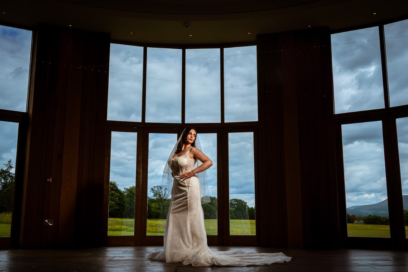 window The Out Barn Wedding Photographer Posing in the window